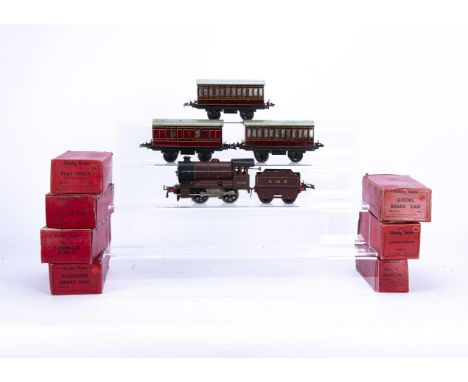 Post-war Hornby 0 Gauge clockwork Trains, the unboxed contents of a No. 501 LMS Passenger set, i.e. crimson loco 5600, tender