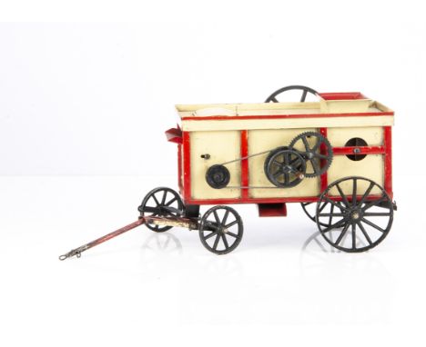 An uncommon Model Threshing Machine by Carette, reference 614/10 in the 1911 catalogue, finished in cream with red trim and b