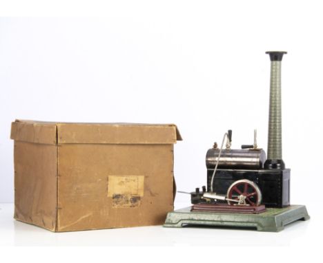 A boxed Bing (BW) Live Steam Stationary Engine, ref 10/15/2, with small oscillating single cylinder on lined maroon base, wit