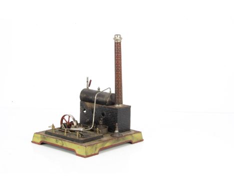 An early Stationary Steam Engine by Doll, on base measuring 9" x 10", finished in lime green with red trim, with single-cylin