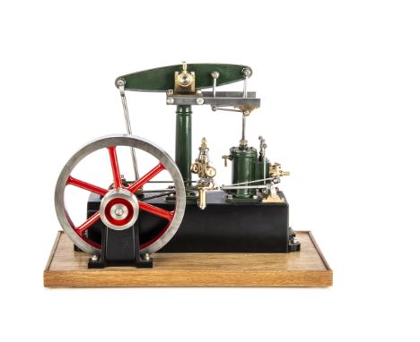 A Stuart Turner single-cylinder Rotary Beam Engine, the base casting approx 13" long, with 1" x 2" cylinder and 7" diameter f
