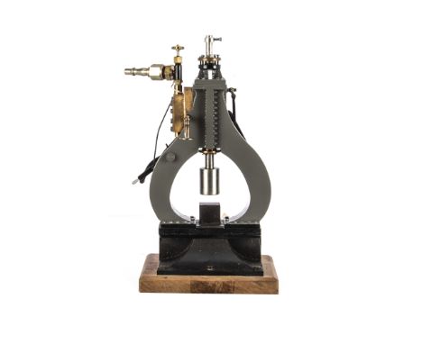 An operating model Steam Hammer by unknown maker, approx 11" high, with single hammer cylinder vertically mounted in 'pear' s