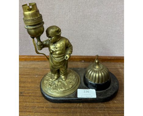 A brass figural table lamp 