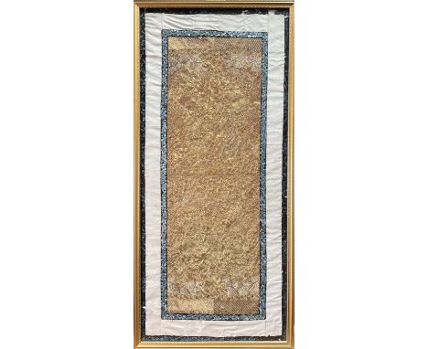 A Chinese silk embroidered panel, 19th century, decorated with dragons in gold metal thread, frame size 72.5 x 34cm.Condition
