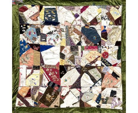 A unusual patchwork quilt, circa 1920's, embroidered by a Falmouth lady who had been a missionary in Peking, one panel was em