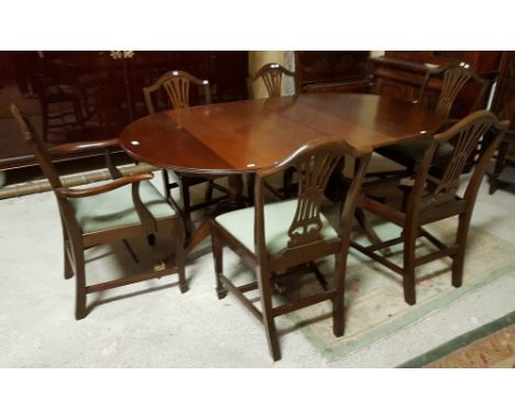 Two Piece Mahogany Dining Room Suite, made by Sinnotts, Limerick - Oval End Dining Table on a Twin Pillar Base, with brass to