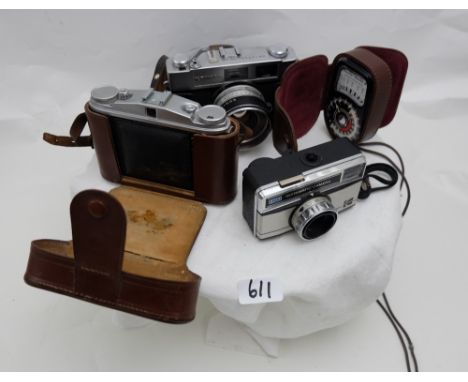 4 old cameras including Alfa, Konica, one Kodak instamatic and a Weston Master meter