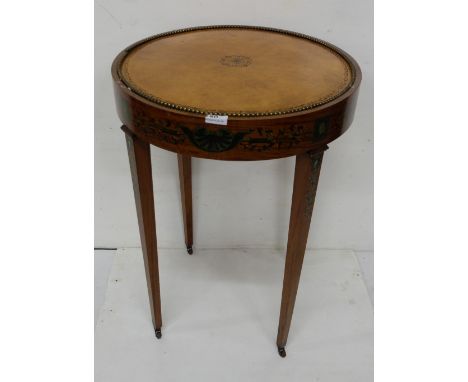 Late 19thC fine Satinwood Circular Occasional Table, a brass stud bordered brown leather top above a painted apron of shells 