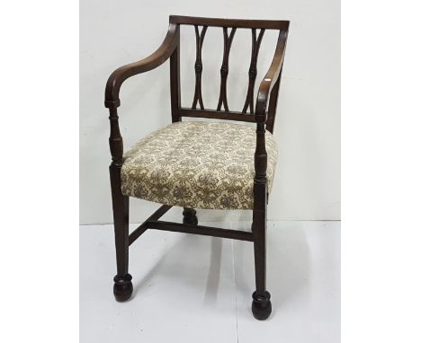 Original Regency Hepplewhite Mahogany Carver Armchair, beige floral upholstered seat atop tapered legs and stretcher support,