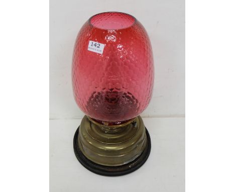 Edw. Brass Container Oil Lamp, with a large red glass shade, 19”h