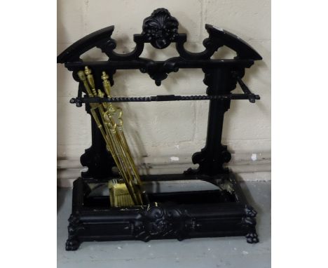 Cast Iron stick Stand, painted black with gargoyle mask with removable tray, lion feet, 29"w x 34"h