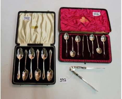 Set of 6 solid silver apostle spoons with tongs (twist-shaped handles) &amp; a set of 6 plated teaspoons, presentation cases 