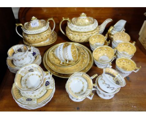 19thC Gold Rimmed Porcelain boat-shaped Teapot with accompanying tea cups, saucers, sugar bowl etc (20 pieces) &amp; a simila