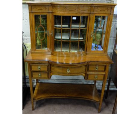 Compact Edwardian Satinwood display Cabinet, the top mounted with brass gallery above glass shelves, the base having a slidin