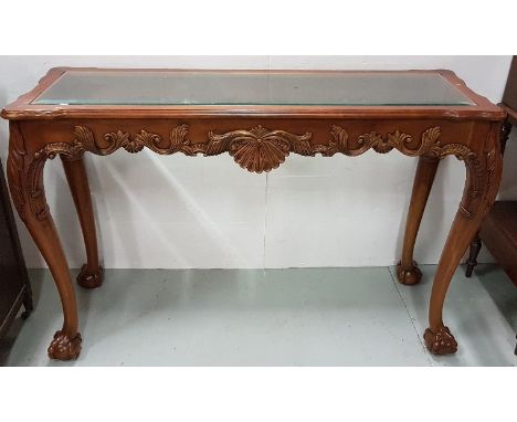 Mahogany Console / Centre Table with decorative apron on both sides, inset with a glass top 