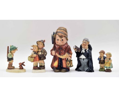 Four Hummel Goebel figures, tallest 8" high; together with a resin judge figure likely by Warren Stratford (5) 