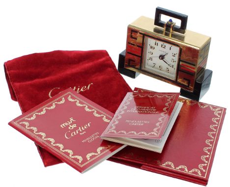 Cartier brass and enamel travel alarm clock in the Art Deco style,&nbsp;the rectangular case with 1.5" square dial marked Car