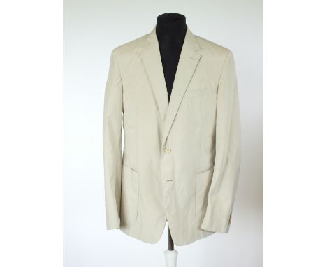 A Prada jacket, beige, lined, single vent, patch pockets, Italian size 54R, 50% polyester, 50% nylon