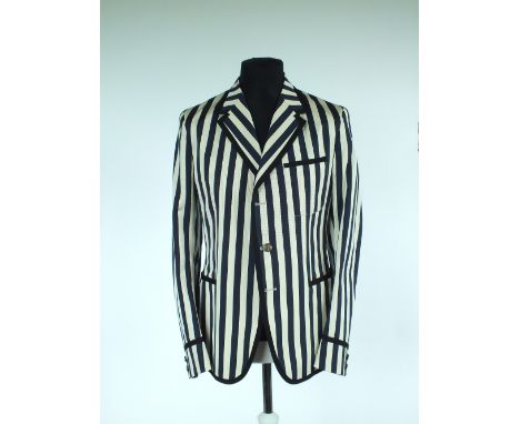 A Gucci jacket, navy blue and ivory stripe with black grosgrain edging detail and patch pockets, lined, Italian size 52R, 62%