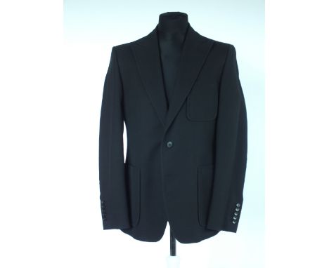 A Gucci jacket, black, patch pockets, single vented, Italian size 52R, 100% cotton