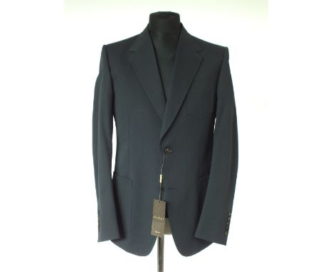 A Gucci jacket, brand new with Gucci swing tickets, navy, patch pockets, single vent, top stitching detail, contrast floral l
