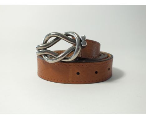 A Gucci light tan belt with knot effect silver buckle, size 38