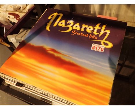 Seventeen LPs to include Nazareth Dead Kennedys (x2) Queen Prince Beastie Boys Devo Rod Stewart(x2) and Michael Jackson(x4)