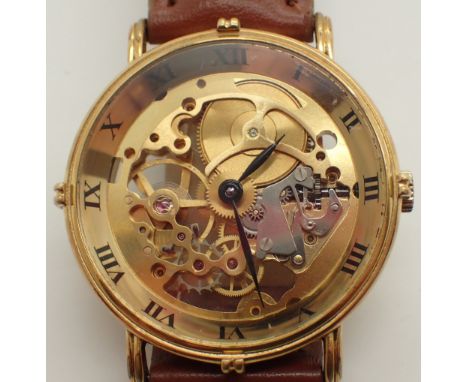 Gents gold plated skeleton wristwatch on leather strap CONDITION REPORT: This item is working at lotting.