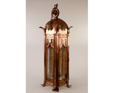 CHARLES VOYSEY STYLE ARTS AND CRAFTS STUDDED COPPER AND LEADED GLASS CEILING LIGHT, in the form of a hexagonal Middle Eastern