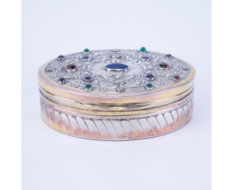 Antique 800 Silver Oval Jeweled Box. Vermeil rim, bottom and interior. Marked 800. Light wear. Measures 4-1/4" L. Weighs appr