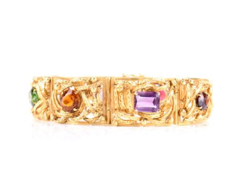 Vintage 18 Karat Yellow Gold and Multi Gemstone Bracelet. Stamped 750. Very good vintage condition. Measures 7-3/4" L, 5/8" W