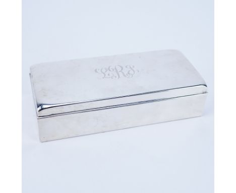 Poole Sterling Silver Cigarette Box. Wood lined. Signed. Good condition. Measures 2" H x 7-1/2" L x 3-1/4" D. Weighs approx. 