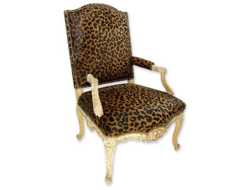 Vintage Cow-Hide Upholstered and Carved Wood Fauteuil Chair. Stencil cheetah print on upholstery and distressed floral carved