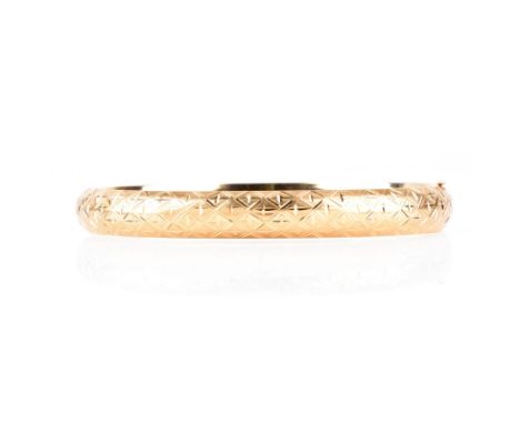 Pair of Vintage 14 Karat Yellow Gold Hinged Bangle Bracelets. Stamped 14K. Very good vintage condition. Measure 5/16" W, 2-1/