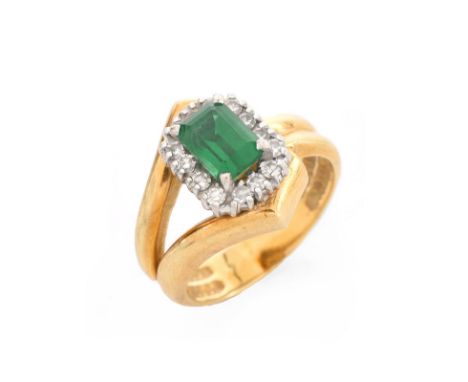 Vintage Emerald, Diamond and 14 Karat Yellow Gold Ring. Emerald measures 7 x 5mm. Stamped 14K. Good vintage condition. Ring s