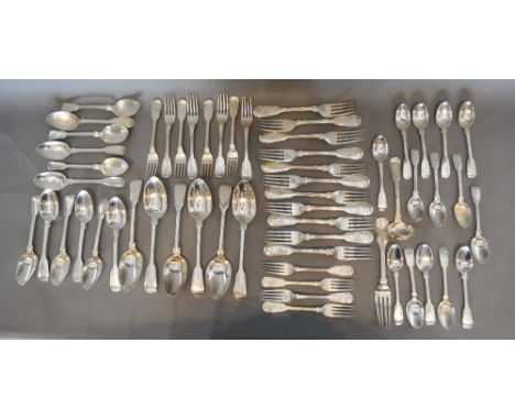 A Victorian Silver Canteen of Cutlery by George Adams to include six tablespoons, eleven table forks, twelve dessert spoons, 