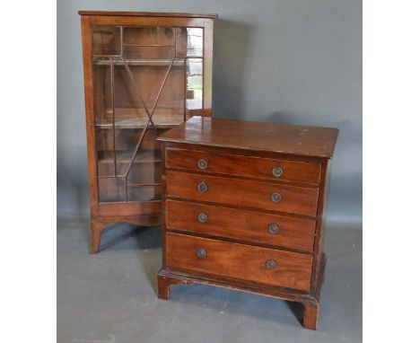 A Small 19th Century Mahogany Straight Front Chest of four drawers with circular brass handles, raised upon bracket feet, 69c
