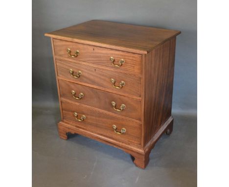 A 19th Century Mahogany Chest, the moulded top above four drawers with brass swan neck handles, raised upon bracket feet, 76c