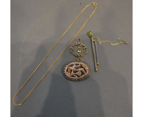 A Small Gold Pendant, set seed pearls and peridot, together with a similar stick pin, and oval brooch and a fine neck chain 