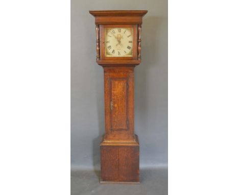 A George III Oak Longcase Clock, the square hood with turned half pilasters, painted dial inscribed Isaac Drayton, Chard, wit