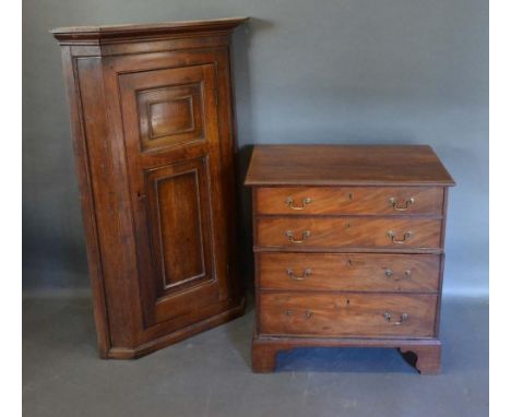 A 19th Century Mahogany Converted Commode, together with a George III oak hanging corner cabinet 