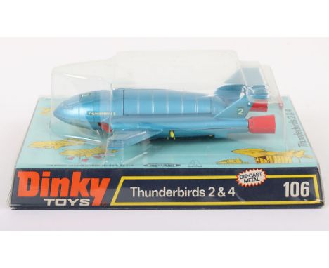 Dinky Toys 106 Thunderbird 2 &amp; 4 From TV series ‘Thunderbirds’ metallic blue body, red thrusters, chrome intakes, yellow 