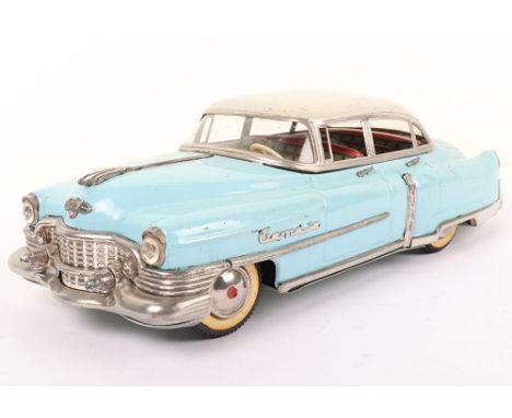 Gama 300 tinplate Cadillac Sedan, 1950s, finished in light blue with cream roof and chrome bumper, grill and details, lithogr
