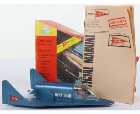 A JR21 Toy Dyna-Soar Space Glider Project Sword, blue plastic body, friction drive motor, realistic astronaut, retractable an
