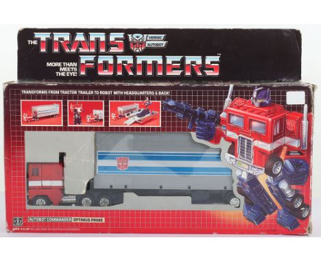 Boxed Hasbro G1 Transformers Autobot Commander Optimus Prime, 1984 issue, transforms from tractor trailer to robot with headq