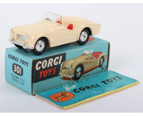 Corgi Toys 301 Triumph TR2 Sports Car, cream body, red seats, flat spun wheels, in excellent bright condition, some paint ret