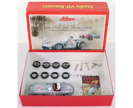 Schuco Studio Mercedes W 196 Sterling Moss Racing Car 1953 Monaco Grand Prix, silver tinplate body, in mint condition with al