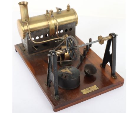 A Mersey Model Co Ltd Steam Engine, horizontal single cylinder stationary engine, with flywheel and piston, connected to too 