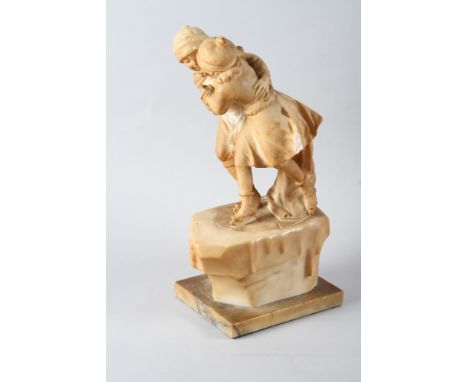 An alabaster table lamp, formed as children ice skating, 15 3/4" high (damages) 