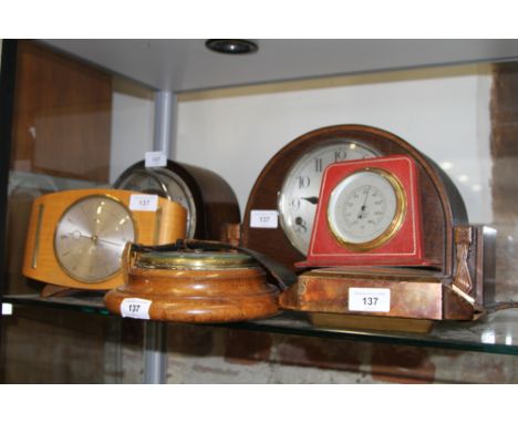 A Smiths oak cased mantel clock with silvered dial and Arabic numerals, 8" high, another similar, 9" high, a burr maple mante